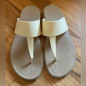 CROCS flip flops, off white, size 8.